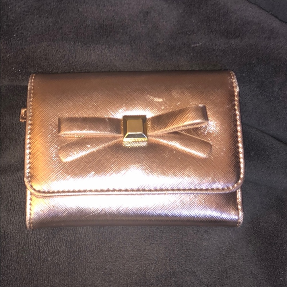 Rose gold wallet with bow